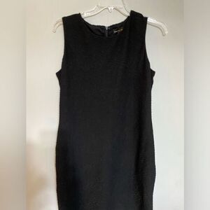 Woman’s Dana buckman sleeveless black‎ dress size 14